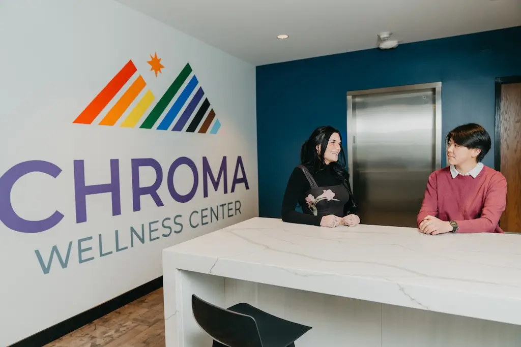 Clients connecting in the reception area of Chroma Wellness Center, reflecting an inclusive and LGBTQIA+ affirming treatment environment.