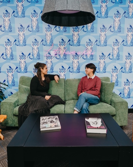 Clients talking in a comfortable lounge during an intensive outpatient program in Denver at Chroma Wellness Center