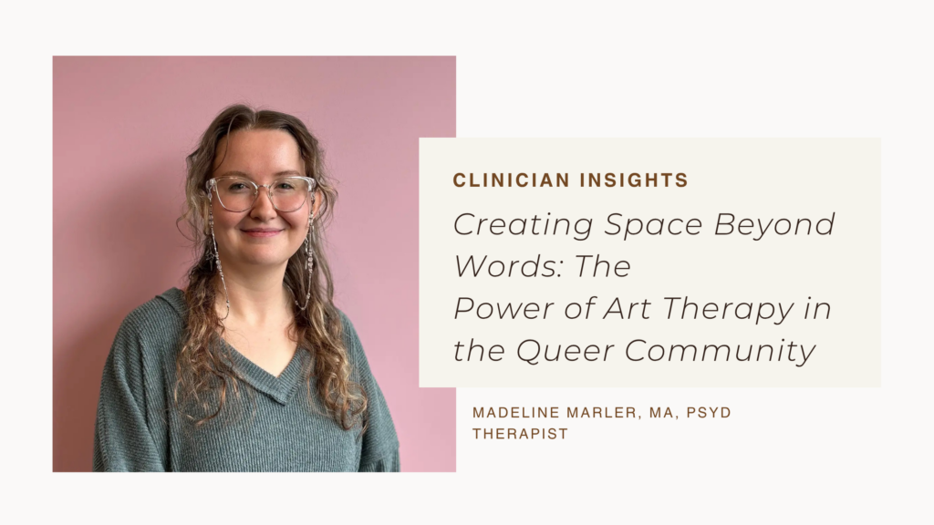 Portrait of a smiling female therapist with glasses against a pink background, featured in a Clinician Insights article on art therapy in the queer community.