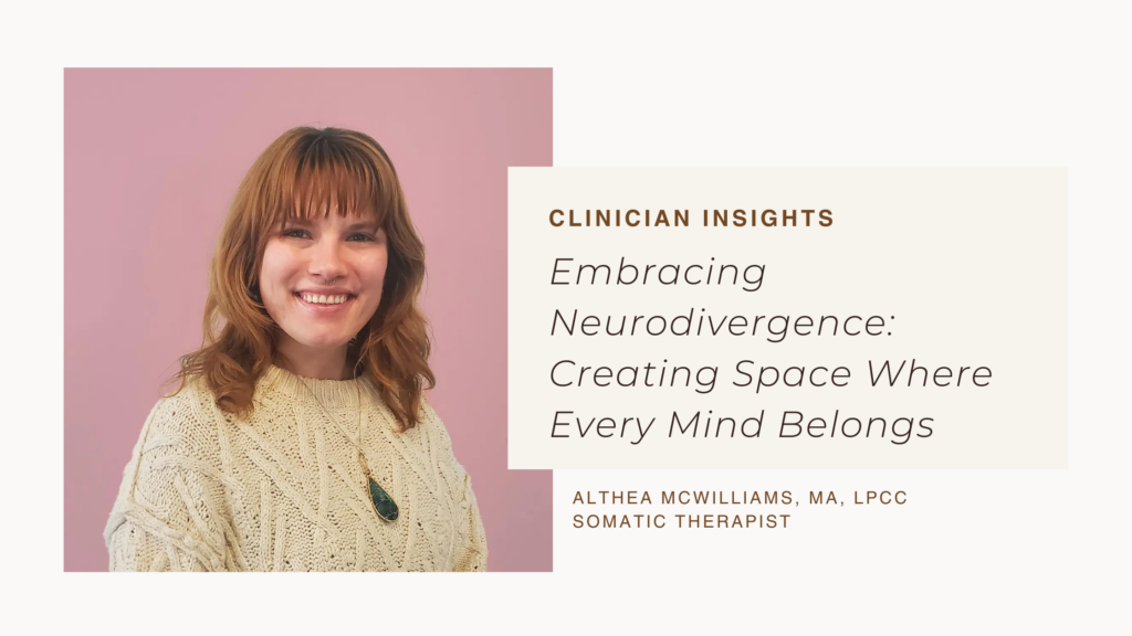 Somatic therapist Althea McWilliams smiling in front of a pink background for a clinician insights article about embracing neurodivergence and creating inclusive spaces where every mind belongs.