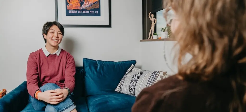 Client speaking with a therapist during an individual counseling session at Chroma Wellness Center in Denver