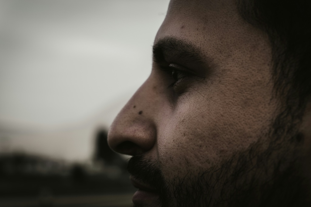 Close-up of a person's nose, representing the identification and detection of unusual or strong odors.